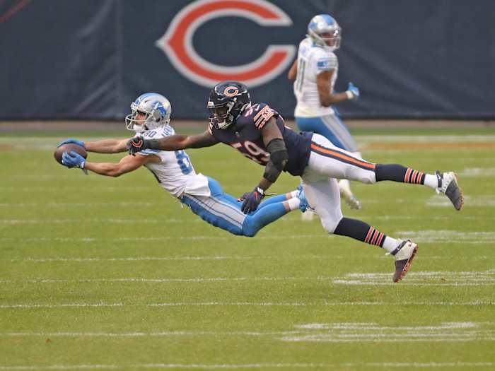 Amendola makes a catch in front of Chicago Bears linebacker Danny Trevathan.